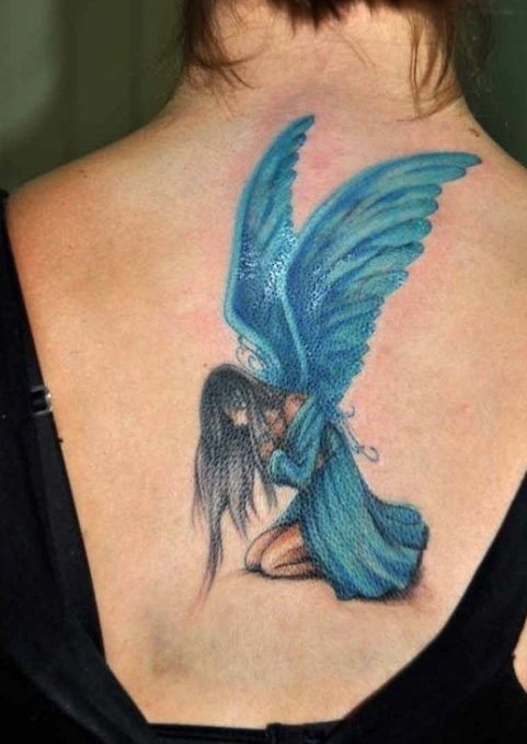 Blue Sad Fairy Tattoo On Back Tattooimagesbiz